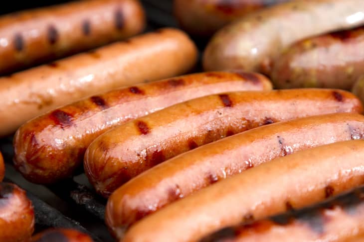 Close up of grilled hotdogs on grill